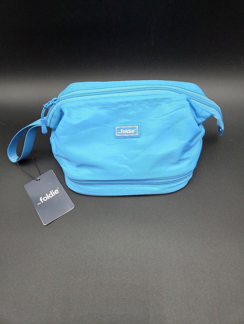 Foldie Bright Blue Travel Lightweight Cosmetic Pouch/Toiletry Bag. NWT